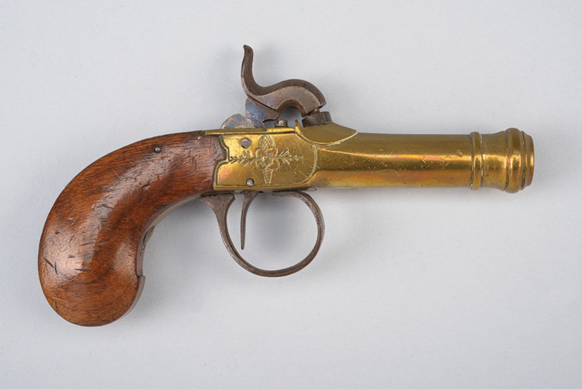 A navy percussion pocket pistol dating: mid-19th Century provenance: Belgium Smooth, round,