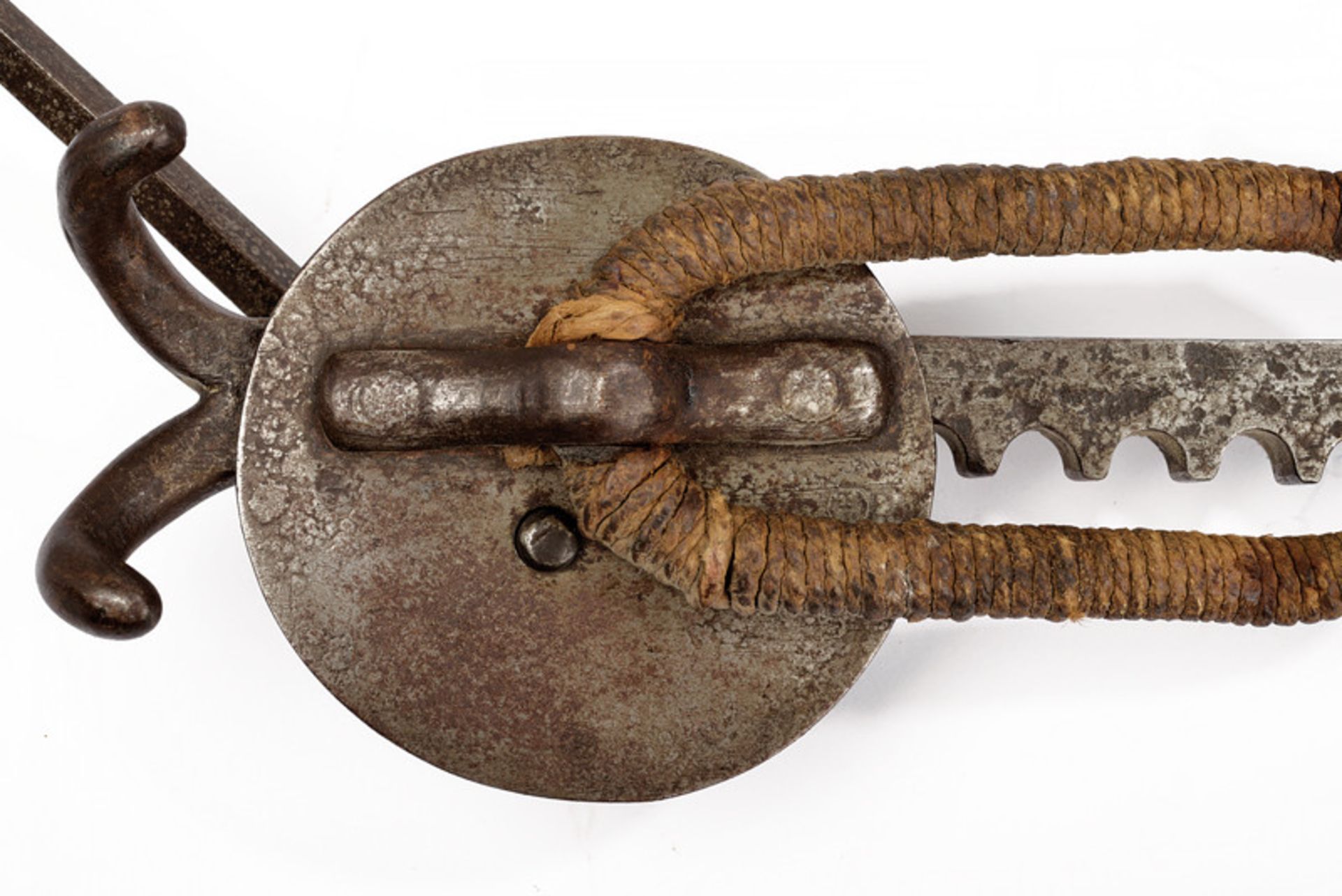 A crossbow jack dating: 17th Century provenance: Germany Round, iron box containing a toothed wheel, - Image 3 of 5