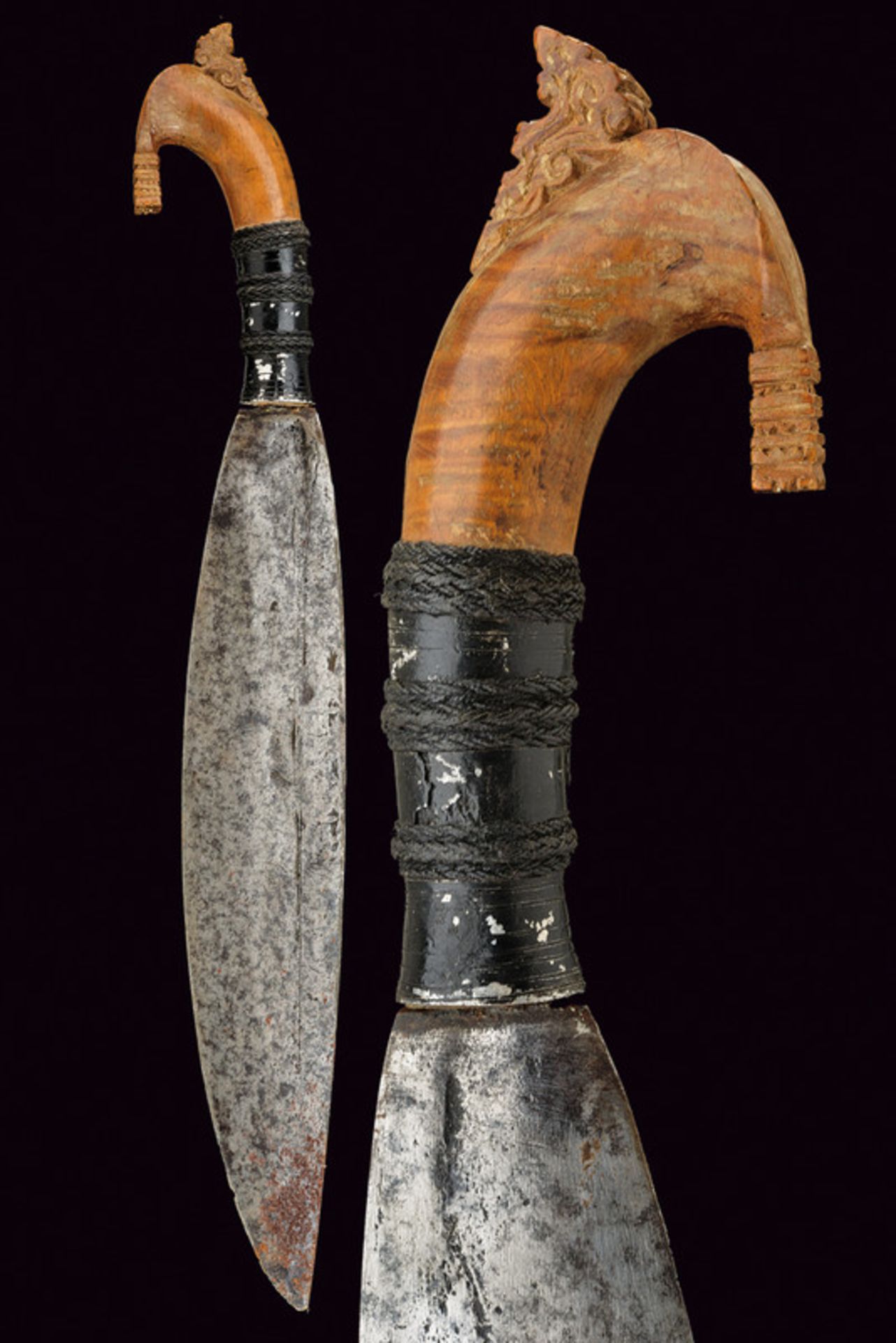 A barong dating: 19th Century provenance: The Philippines Leaf-shaped, single-edged blade; wooden