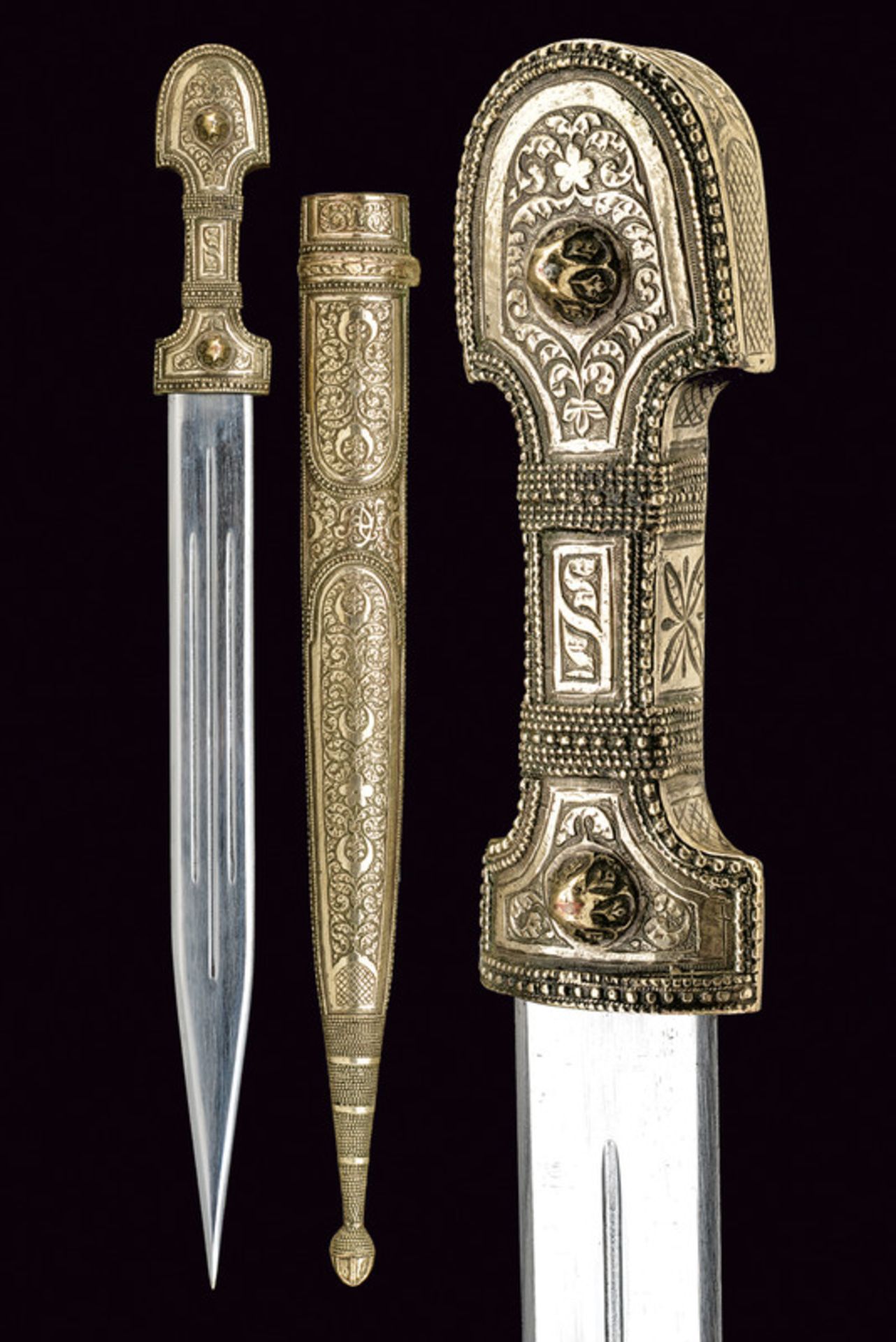 A silver mounted kindjal dating: early 20th Century provenance: Caucasia Straight, double-edged