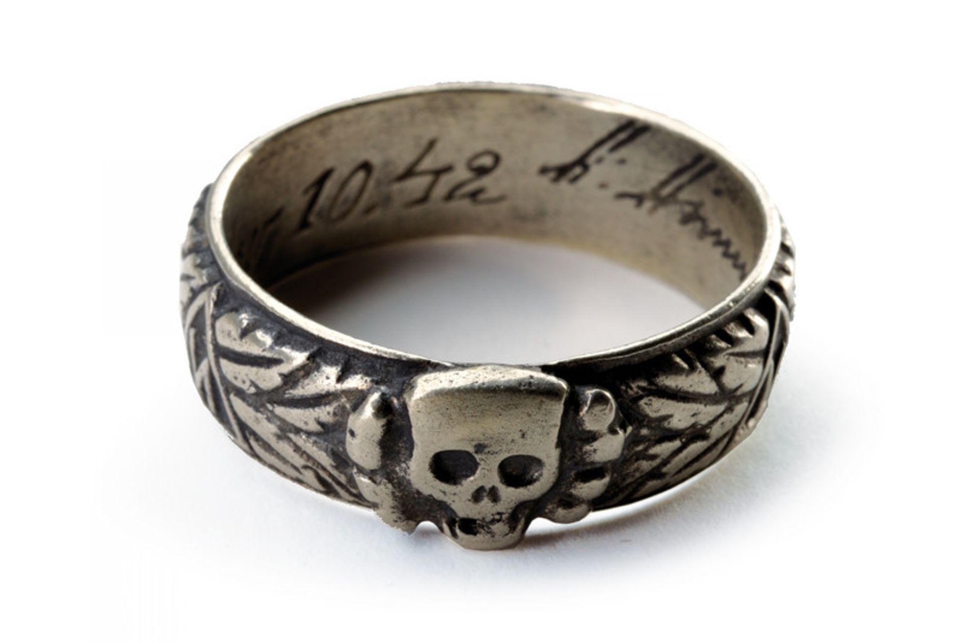 A SS member ring dating: 20th Century provenance: Germany Made of silver, depicting Totenkopf and