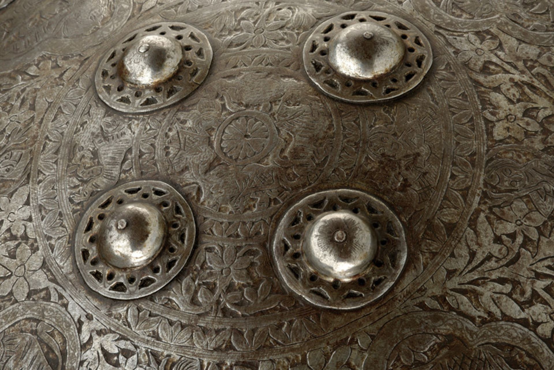 A dhal dating: 19th Century provenance: India Made of iron, decorated with concentric circled with - Image 2 of 4