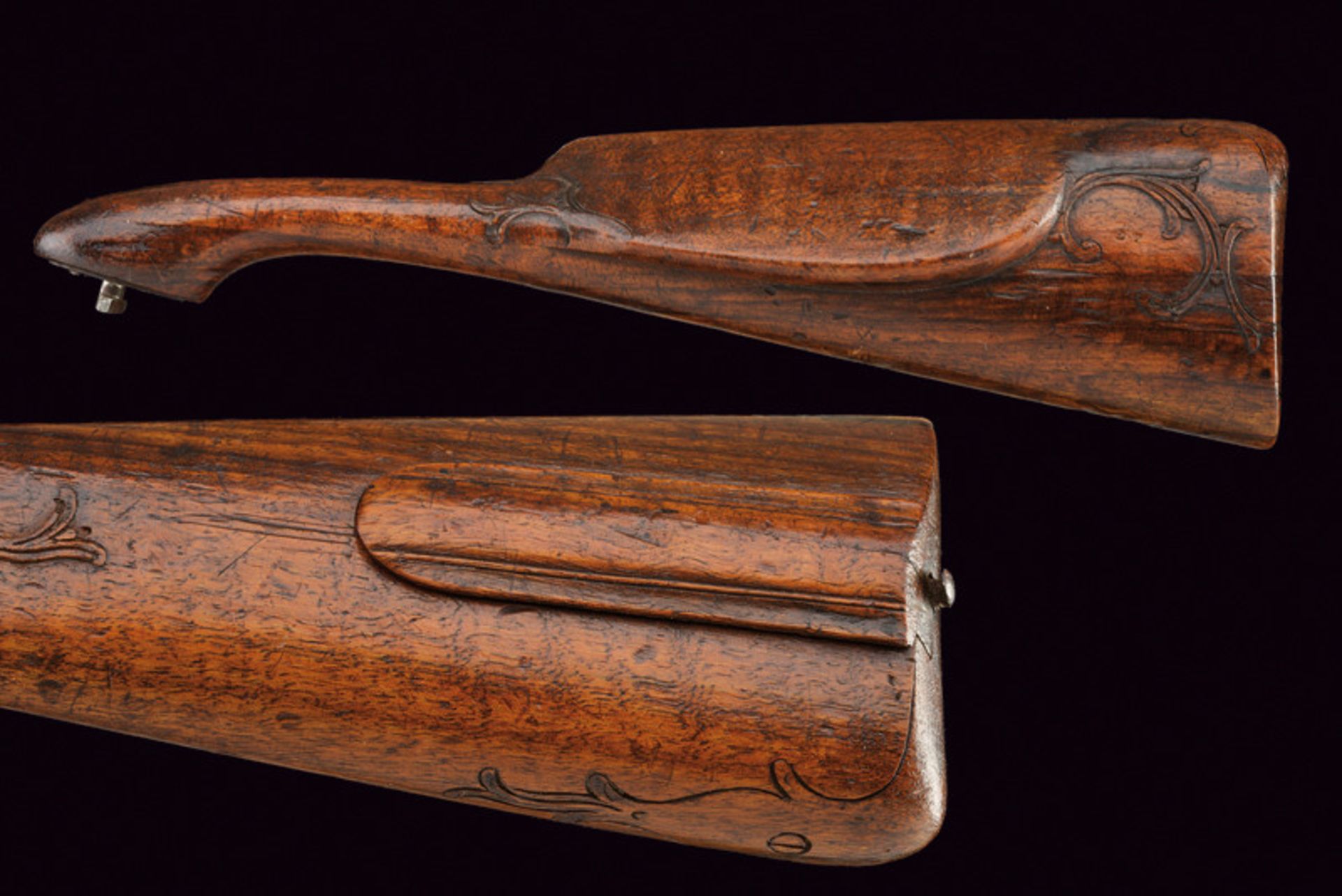 A detachable buttstock dating: 19th Century provenance: Germany Made of wood, slightly sculpted with