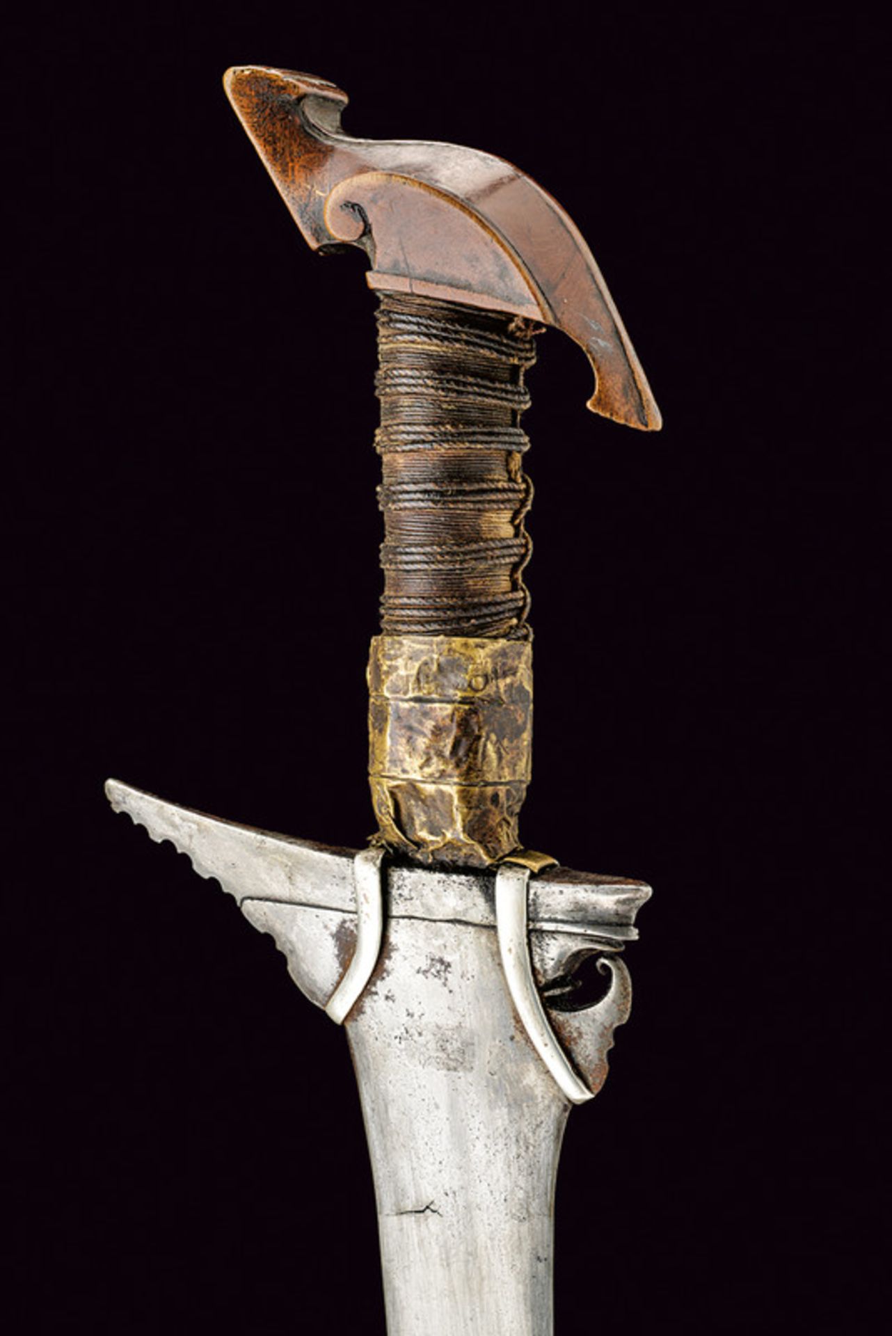 A sundang dating: circa 1900 provenance: The Philippines Smooth, double-edged blade made of pamor, - Image 2 of 2