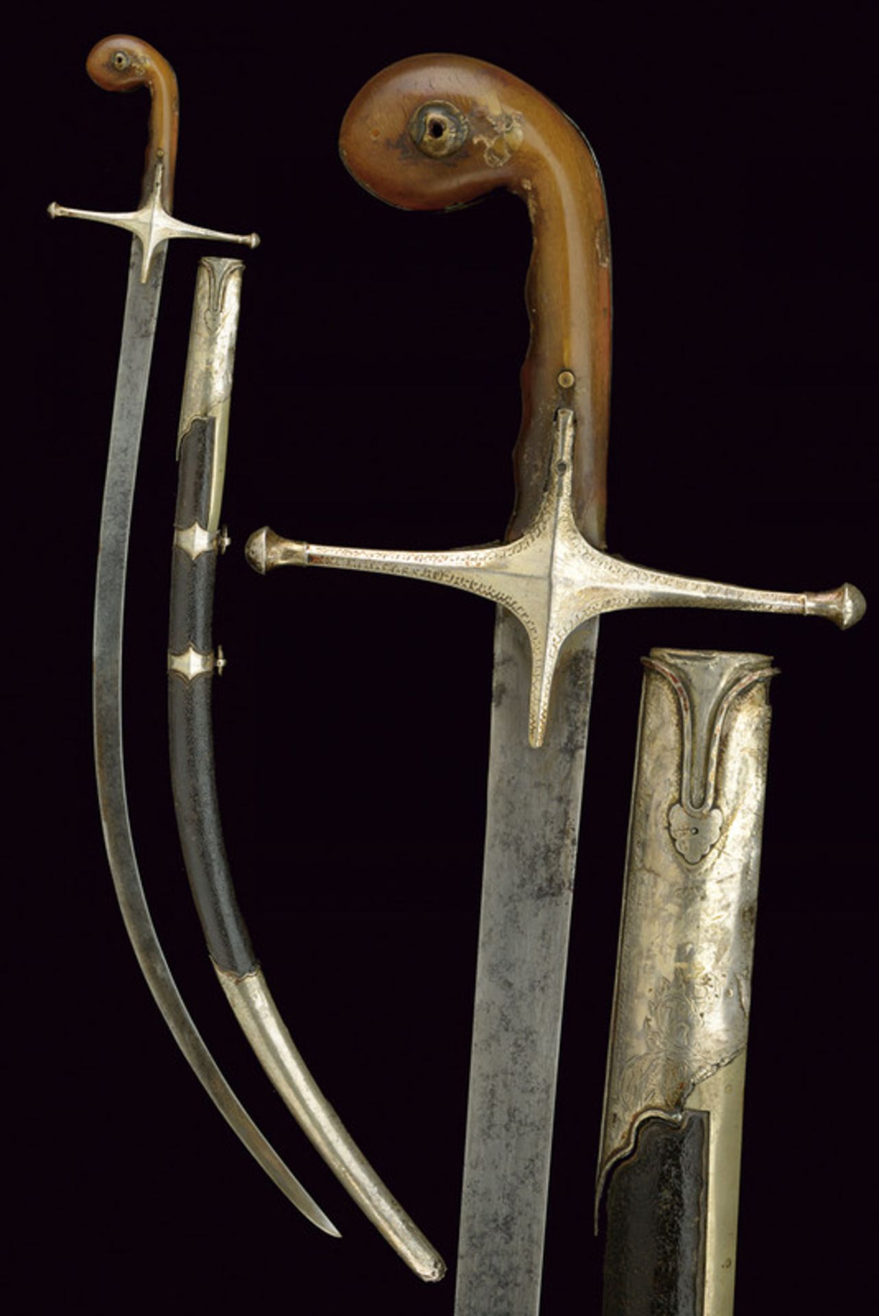 A kilij dating: 19th Century provenance: Turkey Curved, damask (pitting), single-edged blade of