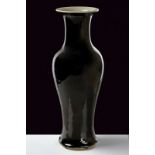 A fine mirror black porcelain vase dating: late 19th Century provenance: China Baluster shape,