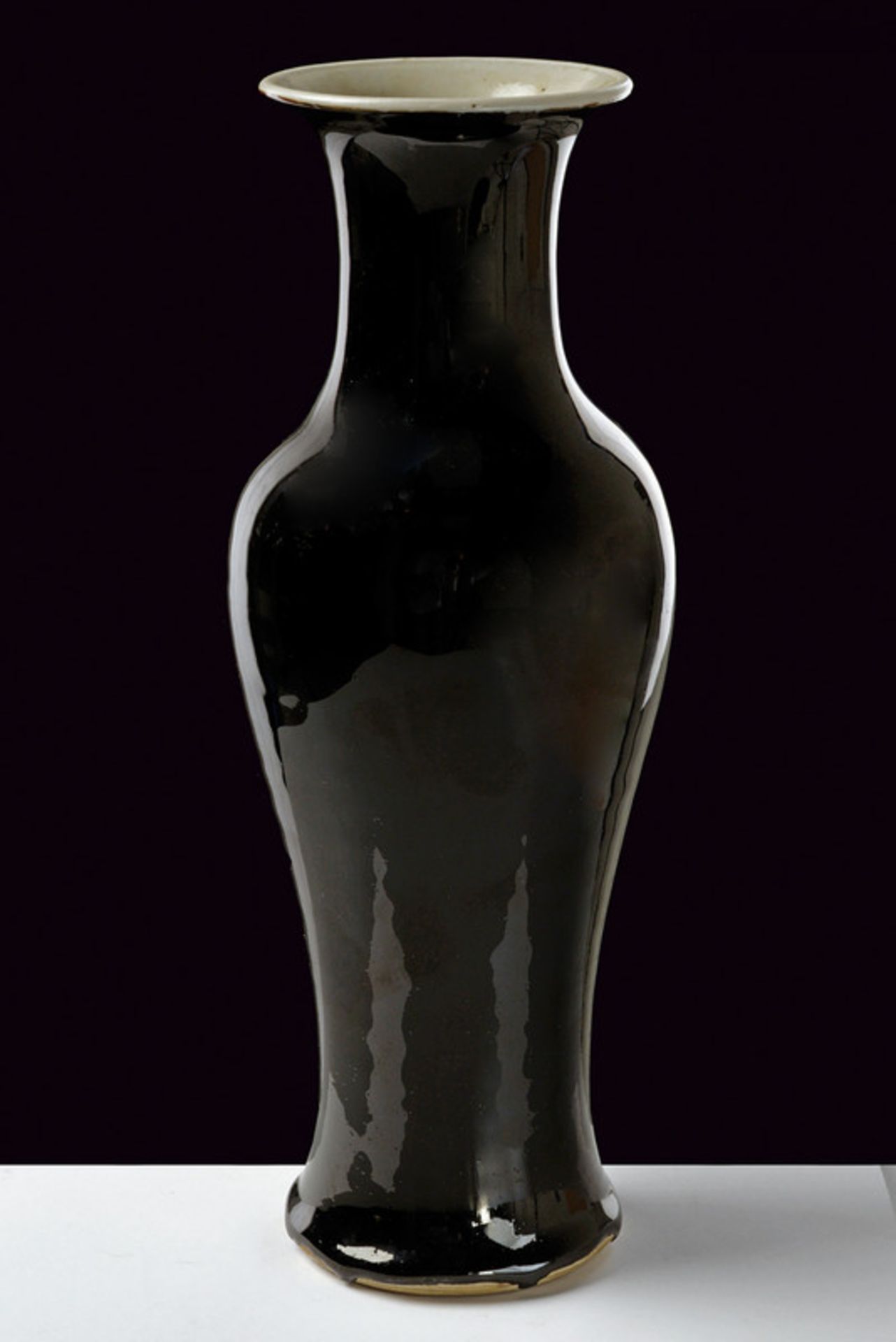 A fine mirror black porcelain vase dating: late 19th Century provenance: China Baluster shape,