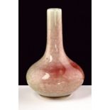 A fine peach bloom style glazed vase dating: 18th Century provenance: China Elegant, flattened, bulb