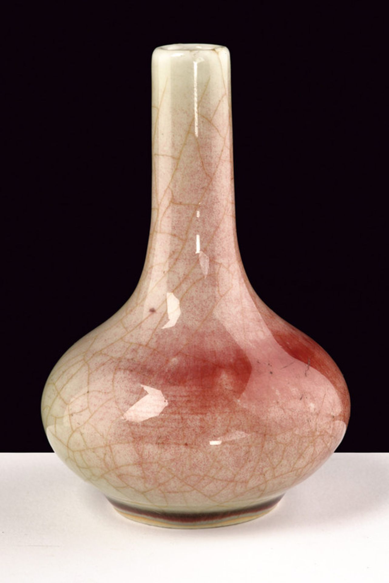 A fine peach bloom style glazed vase dating: 18th Century provenance: China Elegant, flattened, bulb