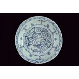 A big blu and white porcelain dish dating: Wanli (1573-1619) provenance: China Elegant, lobed