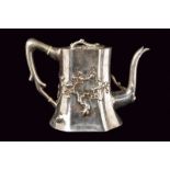 A beautiful and rare silver tea pot for export Luen Wo marked dating: circa 1900 provenance: China