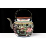 A painted Yixing tea pot dating: 19th Century provenance: China Globular shape, painted with