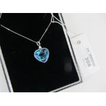 Heart shaped topaz and diamond pendant stamped 750 (topaz approx 30 carat)
