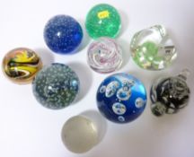 Nine assorted paperweights