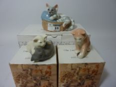 Royal Copenhagen 'Cat in a Basket' and two other cat sculptures (boxed) (3)
