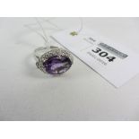 Hallmarked silver ring set with large oval amethyst