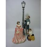 Lladro figure of a lamplighter, Royal Doulton figurines 'Ruth' HN4099 and 'First Prize' HN3911 (3)