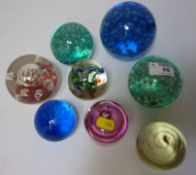 Eight assorted paperweights