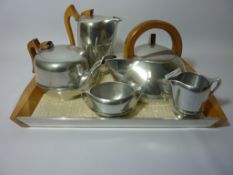 Five piece Picquotware tea set comprising kettle, tea pot, hot water jug, milk jug and sugar bowl,