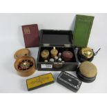 Lacquered box containing hallmarked silver thimbles, inkwell, Stanhope tape measure,