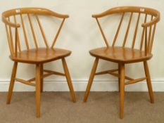 Pair Danish Centa elm and beech stick back elbow chairs