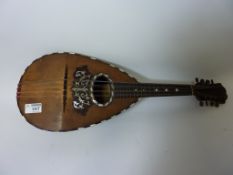 Late 19th/early 20th century Italian mandolin with tortoiseshell fingerboard and mother of pearl