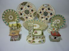 Three Coalport cottages,two similar cottage ornaments,