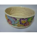 Clarice Cliff for Newport Pottery bowl, the moulded border decorated with flowers and humming birds,