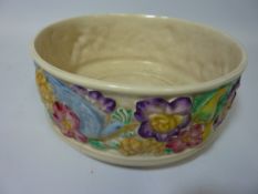 Clarice Cliff for Newport Pottery bowl, the moulded border decorated with flowers and humming birds,