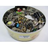 Vintage and later costume jewellery in one tin