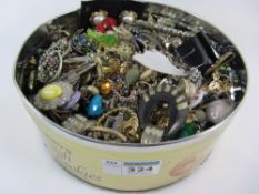 Vintage and later costume jewellery in one tin