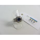 Square set sapphire and diamond ring stamped 9K