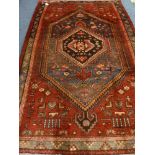 Persian Hamadam red ground rug,