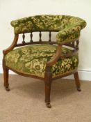 Edwardian walnut tub shaped upholstered armchair, fretwork back panel,