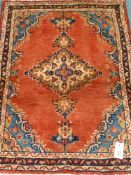 Small Persian Hamadan red ground rug,