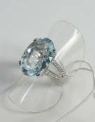 Oval aquamarine and diamond split shank ring stamped 750 (aqua approx 7 carat)