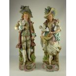 Pair Victorian bisque figures H46cm  Condition Report Female - wing missing from dove. 
Male -