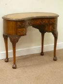 Reproduction mahogany kidney shaped desk, tooled inset leather top, fitted with five drawers,