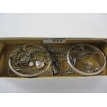 Two hallmarked silver hinged bangles, chain necklaces and lockets stamped 925 ,
