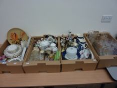 Decorative ceramics and glassware in four boxes
