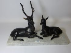 Post War Deco cast metal stag and hind on marble base L50cm