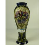 Moorcroft Art Nouveau design vase decorated with pink and purple flowers H21.