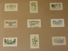 Collection of nine early 20th century silk greeting cards framed as one 69cm x 85cm