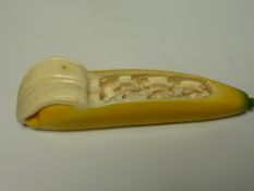 Early 20th century Japanese ivory okimono carving in the form of a partially peeled banana with