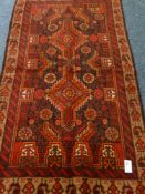 Persian Baluchi red ground rug,