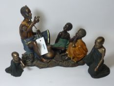 African tribal figure group and two 'Soul Journeys' figures (3)