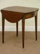 George III mahogany oval drop leaf Pembroke table on spade legs fitted with single end drawer,