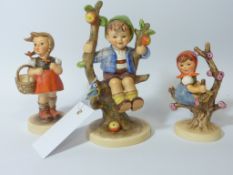 Three Hummel figures - 'Apple Tree Girl' and 'Apple Tree Boy' and 'Little Shopper'