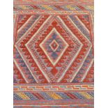 Tribal Gazak red and blue ground rug,