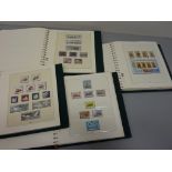 Isle of Man CTOs and mint stamps dating from 1973 onwards in four green albums